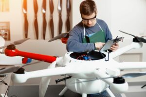 An image of an engineer building a drone 